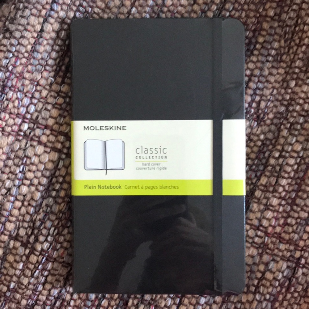 New Moleskine plain classic hard cover notebook